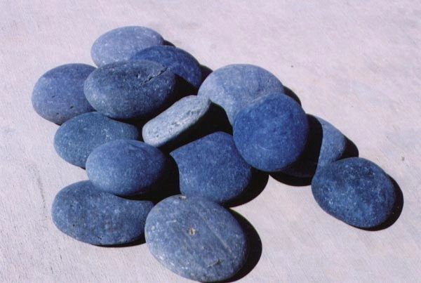 Black Mexican beach pebble garden feature