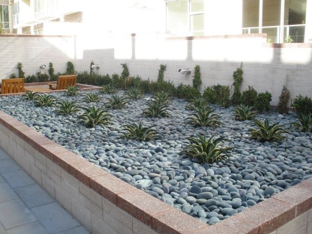 Black Mexican beach pebble water feature