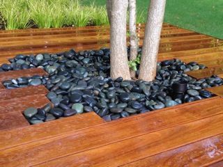 Black Mexican beach pebble dry creek bed